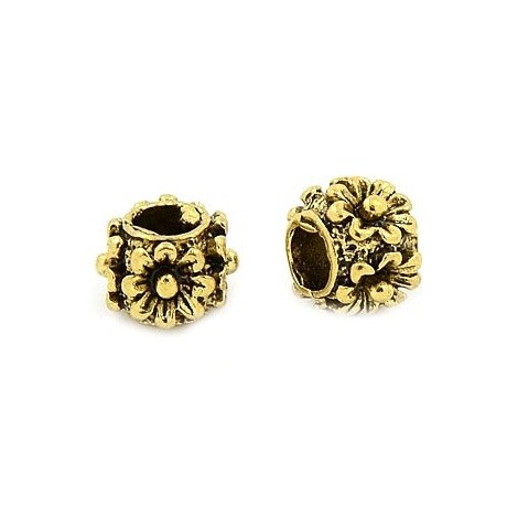 Guld perle med blomster 9 / 5 mm